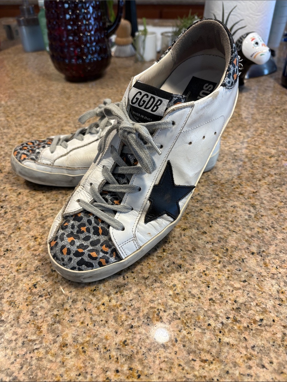 Golden Goose White Leather Sneakers with Black Star and Leopard Accents 40